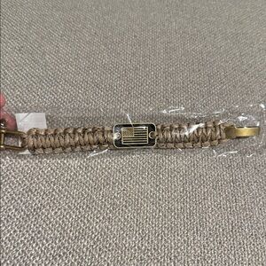 Tan Braided Bracelet with Flag Accent